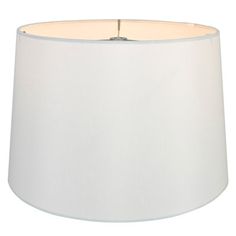 a white lampshade with a light on the bottom and an off - white shade