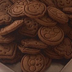 there are many cookies with smiley faces on them