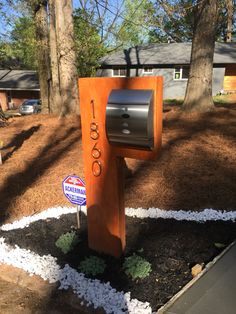 a mailbox in the middle of a yard