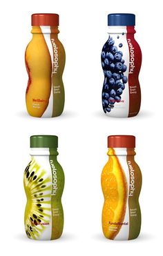 four bottles with different types of fruit juices on the top one is orange, blueberry, and raspberry