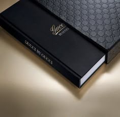 a black book sitting on top of a table