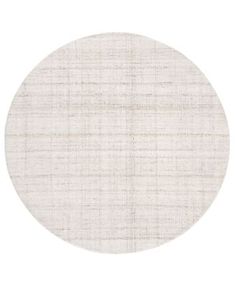 a round white rug on a white background