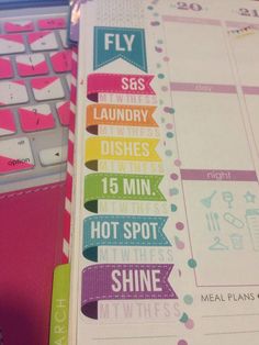 there is a book that has stickers on it and the words are in different colors