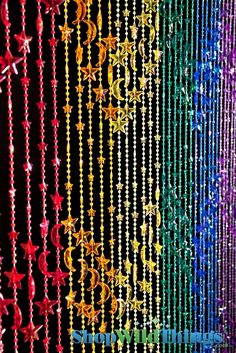 the colors of beads and chains are arranged in rainbows, red, green, blue, yellow