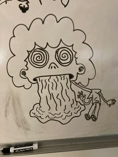 a drawing of a jellyfish on a whiteboard