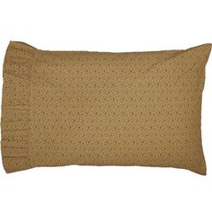 a brown pillow with ruffles on it