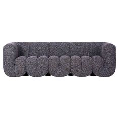 a gray couch with six cushions on it's back and side, in front of a white background