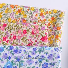 three different types of fabric with flowers on them