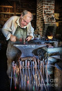 an old man is working on something in his workshop with many tools and hammers