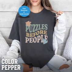 Discover our collection of Puzzling Shirts, perfect for every puzzle lover! These stylish jigsaw puzzle t-shirts make fantastic gift ideas and oversized puzzle gifts for women who cherish their hobby. 𝗗𝗘𝗧𝗔𝗜𝗟𝗦 👕Comfort Colors 1717 tee made with medium fabric 👕 100% US cotton ethically grown and harvested. 👕 Relaxed fit and pre-shrunk for size retention 👕Wash cold inside out, Tumble dry low heat, no dryclean 𝗛𝗢𝗪 𝗧𝗢 𝗢𝗥𝗗𝗘𝗥 1. Select Color and Size 2. Select Quantity 3. Add Perso Puzzle Gifts, Lover Gift Ideas, Shirts Oversized, Color Puzzle, Puzzles Gifts, Fantastic Gifts, Jigsaw Puzzle, Jigsaw Puzzles, Comfort Colors