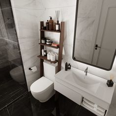 a white toilet sitting next to a bathroom sink