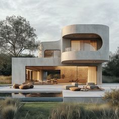 a modern house in the middle of an open field