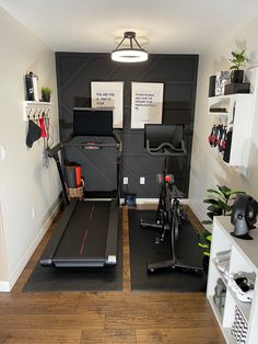 a home gym with treadmills, exercise mats and other equipment in the room