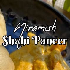 there is a plate with food on it and the words, diframish shabi paneer