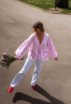 Pink long sleeve blouse with a fun-trendy gingham pattern all over as well as red embroidered heart detailing. This blouse features bows to tie in the front, a slightly loose and flowy fit and does not offer lining. The perfect girly-chic blouse to add to your wardrobe collection. Our models also wear the Striped Baldwin Jeans, Light Blue Maddie Jeans, Pink Taoh Sleeveless Cardigan and White Jane T-Shirt. One size (fits fromUS 2-4-6-8) Length 23.23 in - Width 22.83 in 100% Cotton Washing: handwa Red Striped Shirt Outfit, Pink And Red Outfit, Mum Fits, Valentines Day Fashion, Pink Check Shirt, Red Outfits For Women, Red Striped Shirt, Light Blue Blouse, Pink Long Sleeve Blouse