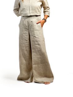 || THE STORY || Very stylish, comfortable and breathable, light and breezy wide leg pants with elastic waist. Simple and modern design is perfect in the office, at the beach and every occasion. || WHAT TO EXPECT AND GENERAL INFORMATION ||t ● Made from 100% European flax ● Elastic waist ● Loose, relaxed fit ● Stone washed for maximum softness ● OEKO-TEX certified product  ● Made from lightweight linen fabric that is very soft, durable and pleasant to the skin ● Machine washable (40 C/104 F) ● Tum Baggy Linen Bottoms For Vacation, Bohemian Style High-waisted Wide Leg Pants, Summer Ramie Bottoms, Chic Linen Wide Leg Lounge Pants, Chic Flax-colored Relaxed Fit Wide Leg Pants, Chic Relaxed Fit Wide Leg Pants In Flax, Chic Wide Leg Pants In Flax With Relaxed Fit, Wide Leg Linen Pants With Elastic Waistband, Full-length Linen Pants For Vacation