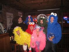 a group of people dressed up in costumes