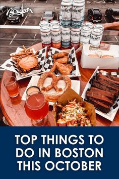 a table topped with lots of food next to drinks and donuts on top of it