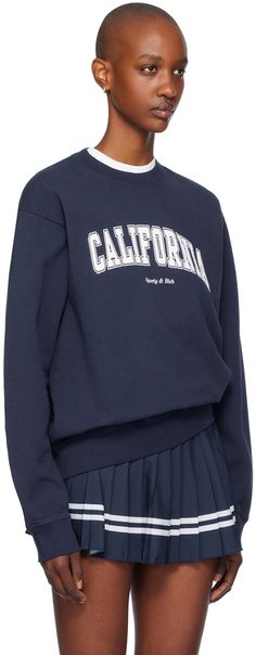 This Sporty & Rich crewneck sweatshirt is crafted from 11.5 oz cotton fleece that is pre-shrunk and garment-dyed. It features an oversized fit, rib-knit crewneck, hem, and cuffs, as well as a printed text and logo at the front. Sweatshirt Oversized, Green Sweatshirt, Sporty And Rich, Scarf Men, Mens Scarves, Knit Crewneck, Fleece Sweatshirt, Suit Accessories, Rugby Shirt