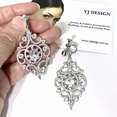 "A pair of vintage style screw back clip on bridal earrings for non-pieced ears. This Victorian wedding bridal jewelry is made of clear cubic zirconia, framed onto tarnish-resistant silver rhodium frames. Earrings measure about 2 1/8\" (5.4cm) including clipons. View matching pieces or similar designs at https://etsy.me/3ijRdIN View all Victorian inspired accessories https://etsy.me/2uAseFc Only selected earrings are offered in screw back clipons style at https://etsy.me/TJ8w7m View all earring Bridal Jewelry Vintage, Bridal Earrings Drop, Victorian Wedding, Fan Earrings, Vintage Style Wedding, Earrings Clip, Cz Jewelry, Cubic Zirconia Earrings, Wedding Jewelry Earrings