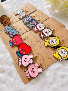 Lightweight 3D Printed BTS Earrings. Printed using PLA material. Nickel-free, hypoallergenic. Dimension: Cooky --- Width 1.2 inches --- Length 1.5 inches --- Drop length 2.1 inches Chimmy --- Width 1.5 inches --- Length 1.6 inches --- Drop length 2.5 inches Shooky --- Width 1.5 inches --- Length 1.3 inches --- Drop length 2.0 inches RJ --- Width 1.2 inches --- Length 1.5 inches --- Drop length 2.2 inches Koya --- Width 1.5 inches --- Length 1.1 inches --- Drop length 1.8 inches Mang --- Width 1. Kou Diabolik Lovers, Bts Earrings, Bt21 Cooky, Army Accessories, 3d Printed Earrings, Bts Clothing, Earrings Kawaii, Cartoon Kawaii, Diy Journal Books