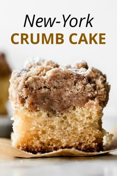 a close up of a piece of cake on a plate with the words new york crumb cake