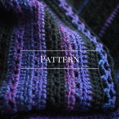 a purple and green knitted blanket with the words pattern on it in white text