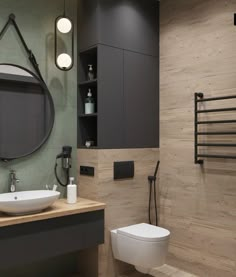 a bathroom with a toilet, sink and mirror in it's center wall area