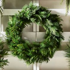 NEW for 2024A fluffy and lush green wreath that is perfect to fill in an empty space on your wall or hang on your front door! This Christmas wreath looks and feels like a real wreath. Made by Raz Imports. Made of plastic. Dimensions: 36". Item #: W4424597 Real Wreath, Animated Christmas Decorations, Nightmare Before Christmas Village, Disney Christmas Village, Pine Christmas Wreath, Christmas Ornament Storage, Christmas House Lights, Christmas Tree Storage, Old World Christmas Ornaments