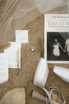 the wedding items are laid out on the sand and ready to be used as decorations