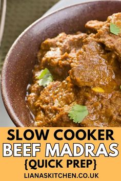 slow cooker beef madaras in a bowl with cilantro on the side