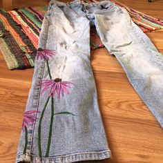 Liz Claiborne straight leg jeans hand painted with echinacea flowers Acrylic paint mixed with textile medium on denim Size 4 short Safe for the washer Hand Painted Denim Pants, Jeans Painting Flowers, Acrylic On Clothes, Floral Painted Jeans, Painted Flowers On Jeans, Fabric Paint Jeans, Flower Painted Jeans, Paint Clothes Ideas, Painted Jeans Flowers