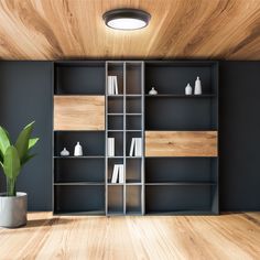 an empty book shelf with books and vases on it