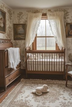 a baby's room with a crib, rocking chair and window