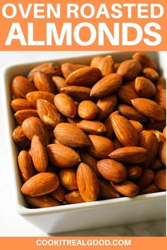 almonds in a square bowl with text overlay that reads oven roasted almonds