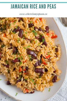 rice with beans and carrots on a white plate