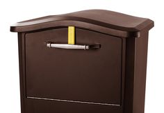 the mailbox is brown and has a yellow stripe on its handle, as well as a