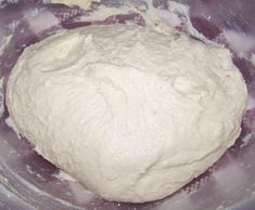 the dough is being mixed together in a bowl