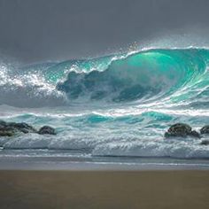 an ocean wave crashing on the beach with rocks in the foreground and dark clouds overhead