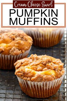 three muffins on a cooling rack with the words cream cheese swirl pumpkin muffins