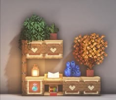 an image of a desk with plants and books on it in minecraft style mode