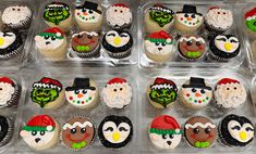 cupcakes decorated with christmas themed frosting in plastic containers