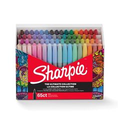 the box is full of sharpie crayons with different colors and designs on them