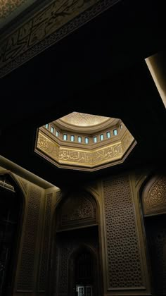 the inside of a building with an intricate ceiling