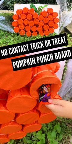 there are carrots that have been placed on the ground for trick or treat pumpkin punch board