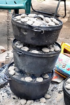 three buckets are stacked on top of each other