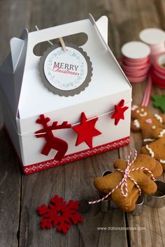 a box with some cookies in it on a table