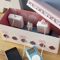 there are three ipods plugged into the charger in this box, and one is connected to an mp3 player