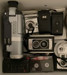 there are many different types of cameras in this box