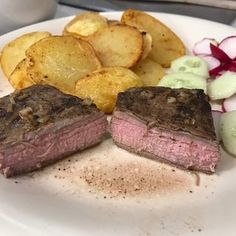 a plate with steak, potatoes and radishes on it is ready to be eaten